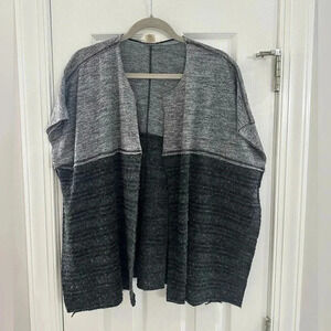 Mystree short sleeve Cardi.  Its got a loose fit and a great layering piece.